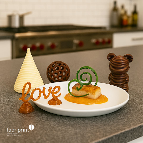 Sobremesas criadas com impressoras 3D alimentares em chocolate e açúcar numa cozinha moderna